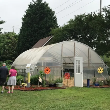 a group of people outside a tent