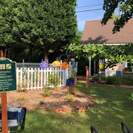 a sign in front of a house