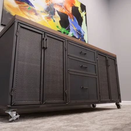 Industrial metal storage cabinet with perforated doors, wooden top, caster wheels, under a colorful abstract painting.