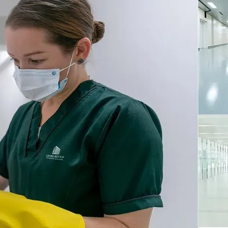Cleaning staff wearing masks and gloves sanitizing hospital surfaces and corridors for hygiene and safety.