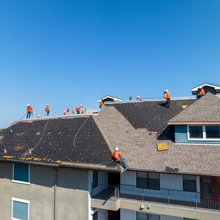 a group of people on top of a roof