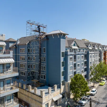 a group of buildings with a tower