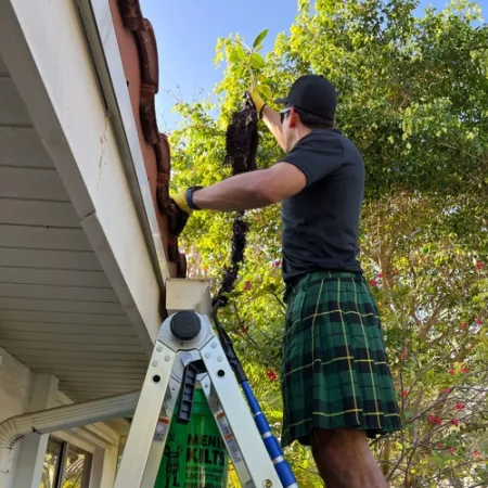 a person standing on a ladder