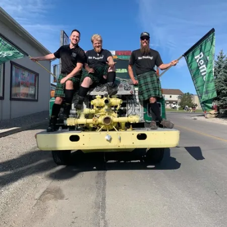 a group of men on a tank