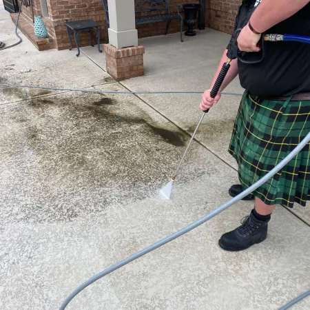 a woman holding a broom