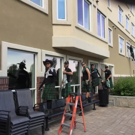 a group of people standing outside a building