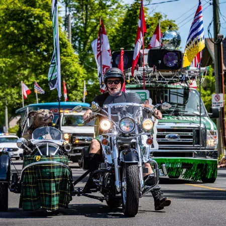 a couple of men riding motorcycles