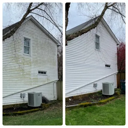 a white house with a garage