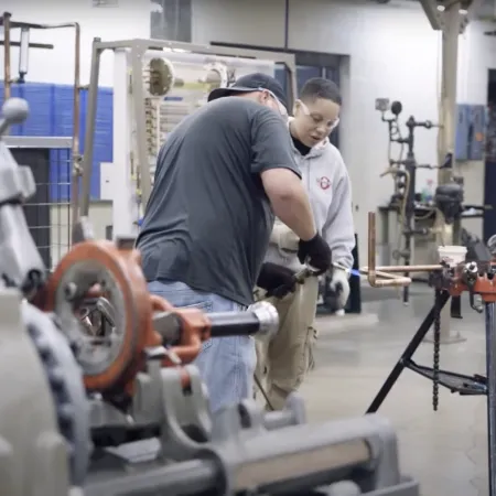 a group of people working in a factory