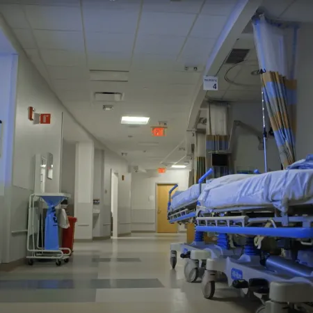 a hospital room with a bed and medical equipment