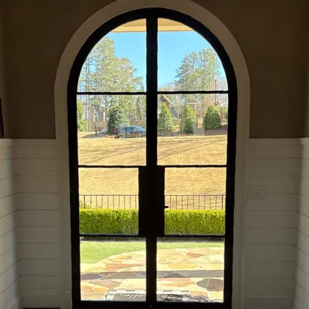 a doorway with a glass railing