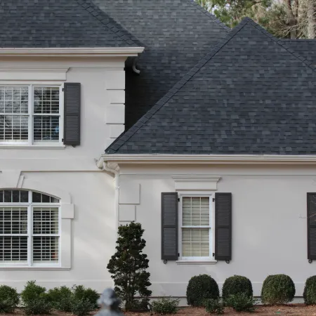 A white home with louvered shutters