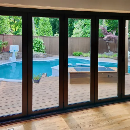 Bifold door from Infinity overlooking backyard pool