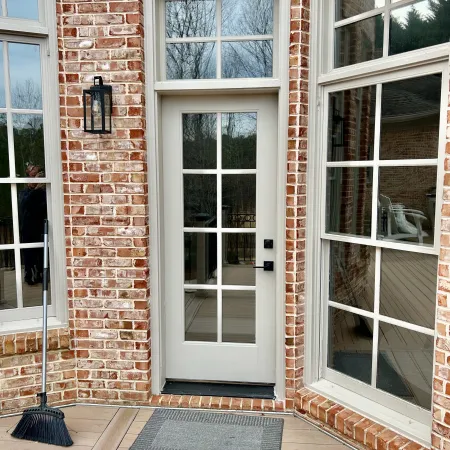 Brick house with fiberglass hinged patio door