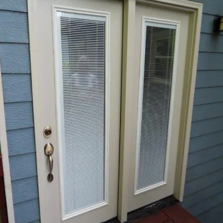 Fiberglass French door with blinds between glass