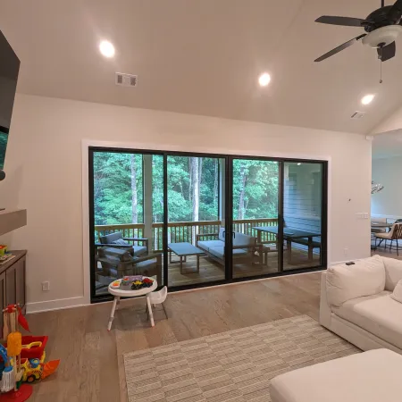 Living room with black sliding door Installation from North Georgia Replacement Windows