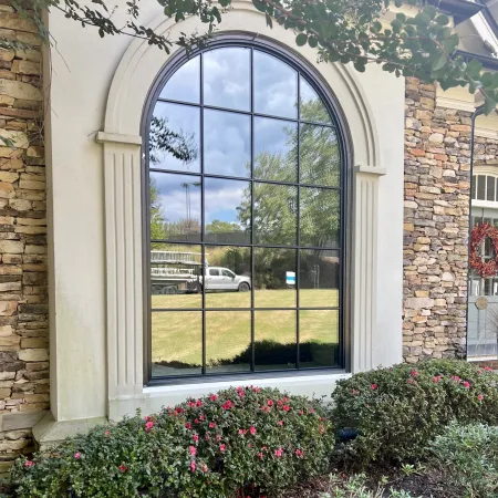 Black round top window replacement exterior view