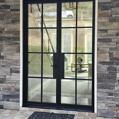 Double modern glass and black iron front entry