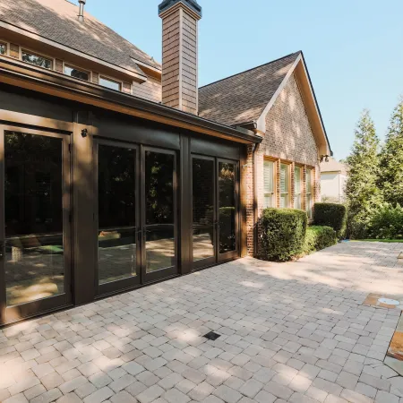 a house with a brick patio
