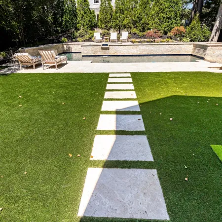 a small pool in a backyard