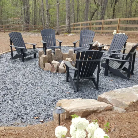 a group of chairs and a table outside