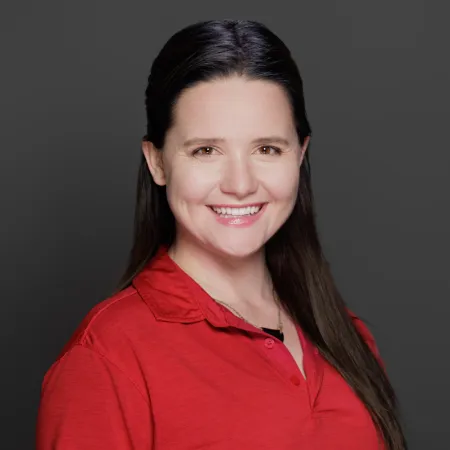 a person smiling for the camera