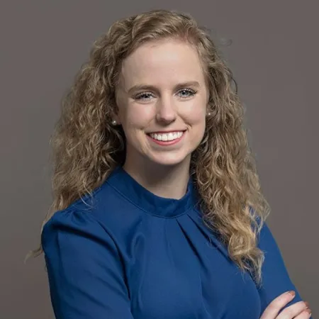 a person with the arms crossed