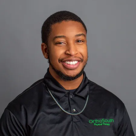a man smiling for the camera