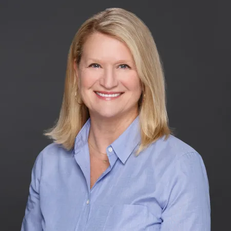 a woman in a blue shirt