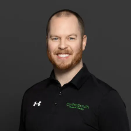 a man smiling for the camera