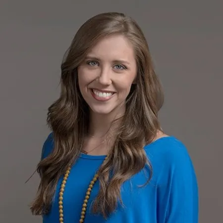 a woman in a blue shirt