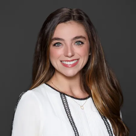 a person smiling for the camera