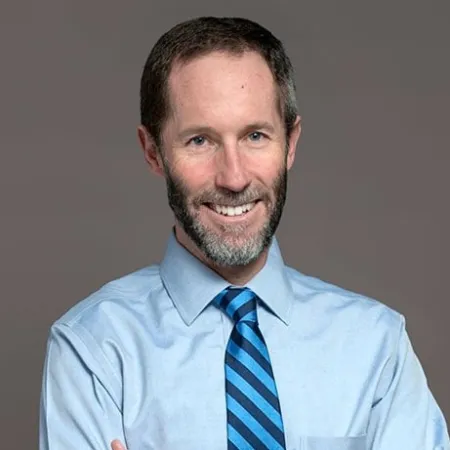 a man with his arms crossed