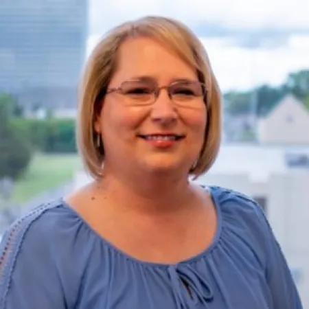 a woman wearing glasses