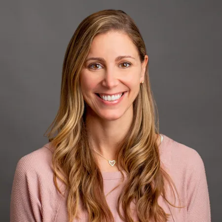 a person smiling for the camera