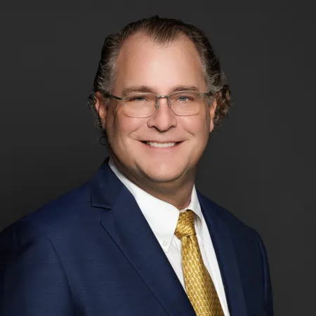 a man wearing a suit and tie