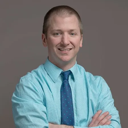 a person with the arms crossed