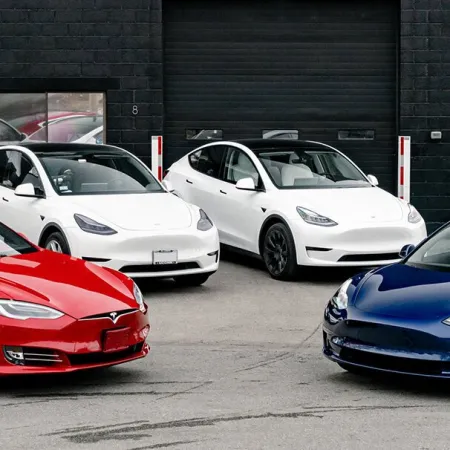 a group of cars parked in a parking lot