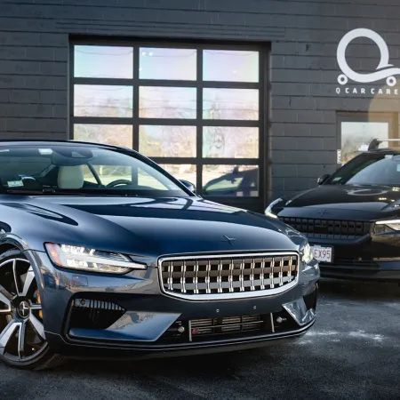 a couple of cars parked in a garage