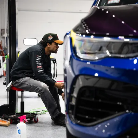 a man working on a car