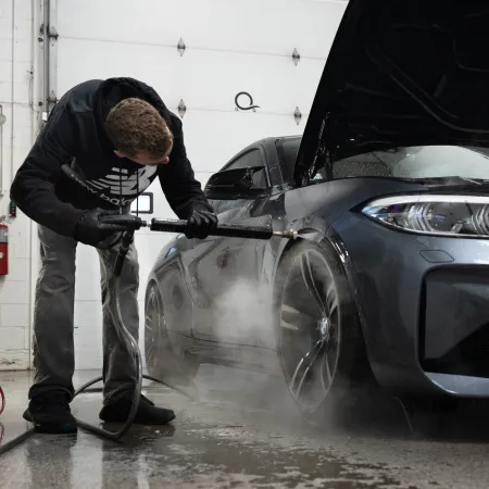 a man working on a car