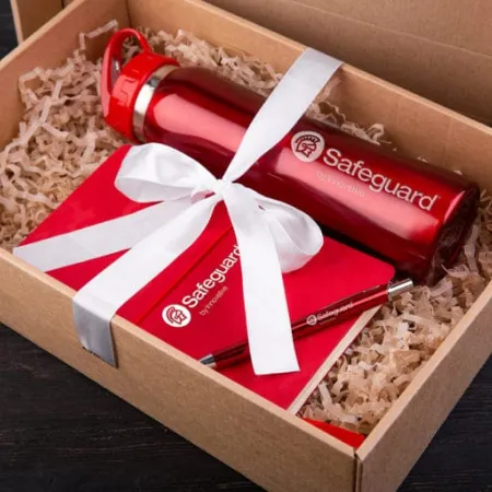 a giftbox with a notebook and water bottle