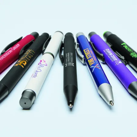 a group of different colored pens