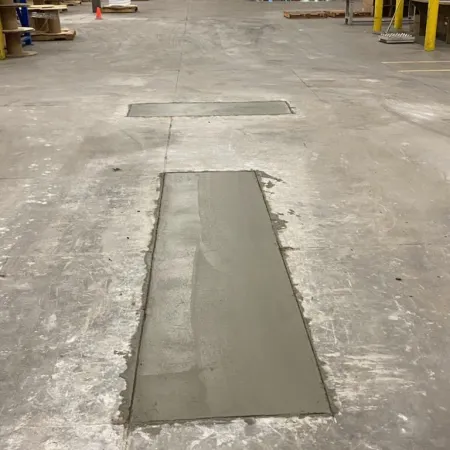 a concrete floor with a hole in it