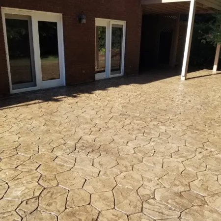 a brick walkway in front of a building