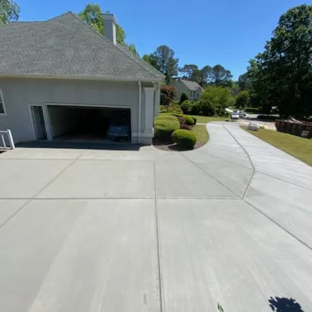 a driveway leading to a house