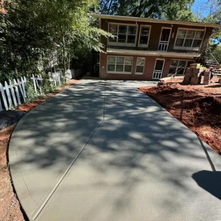 a driveway leading to a house