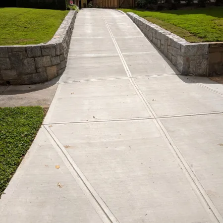 Elegant driveway entrance leading to home