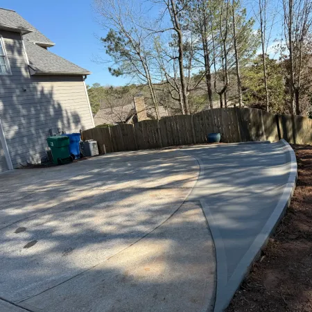 Driveway extension adding parking space for one more vehicle