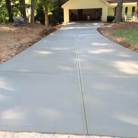 a driveway leading to a house